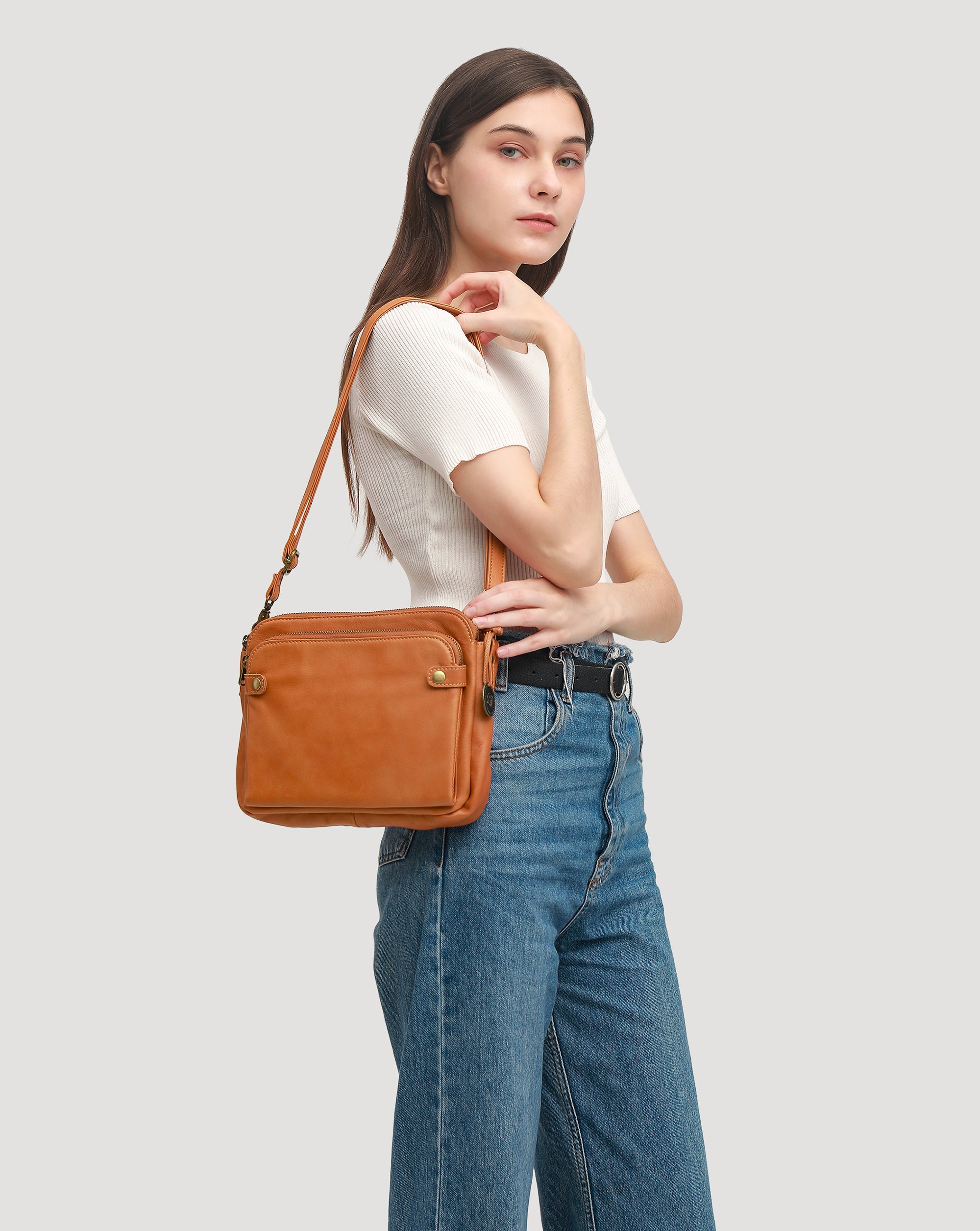 The Bali Three-Layer Leather Crossbody Shoulder & Clutch Bag.